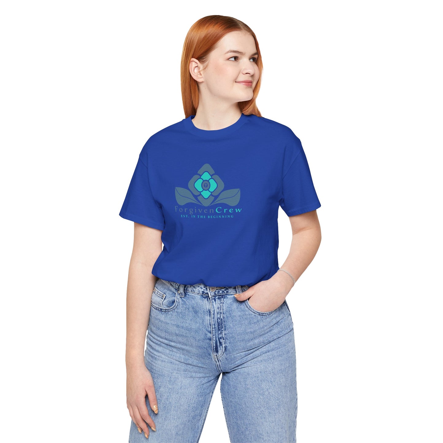 Forgiven Crew Christian Clothing Model showing the front of the navy blue christian t-shirt, Christian shirt has a blue 2 tones flower with forgiven crew and est. in the beginning printed below the flower