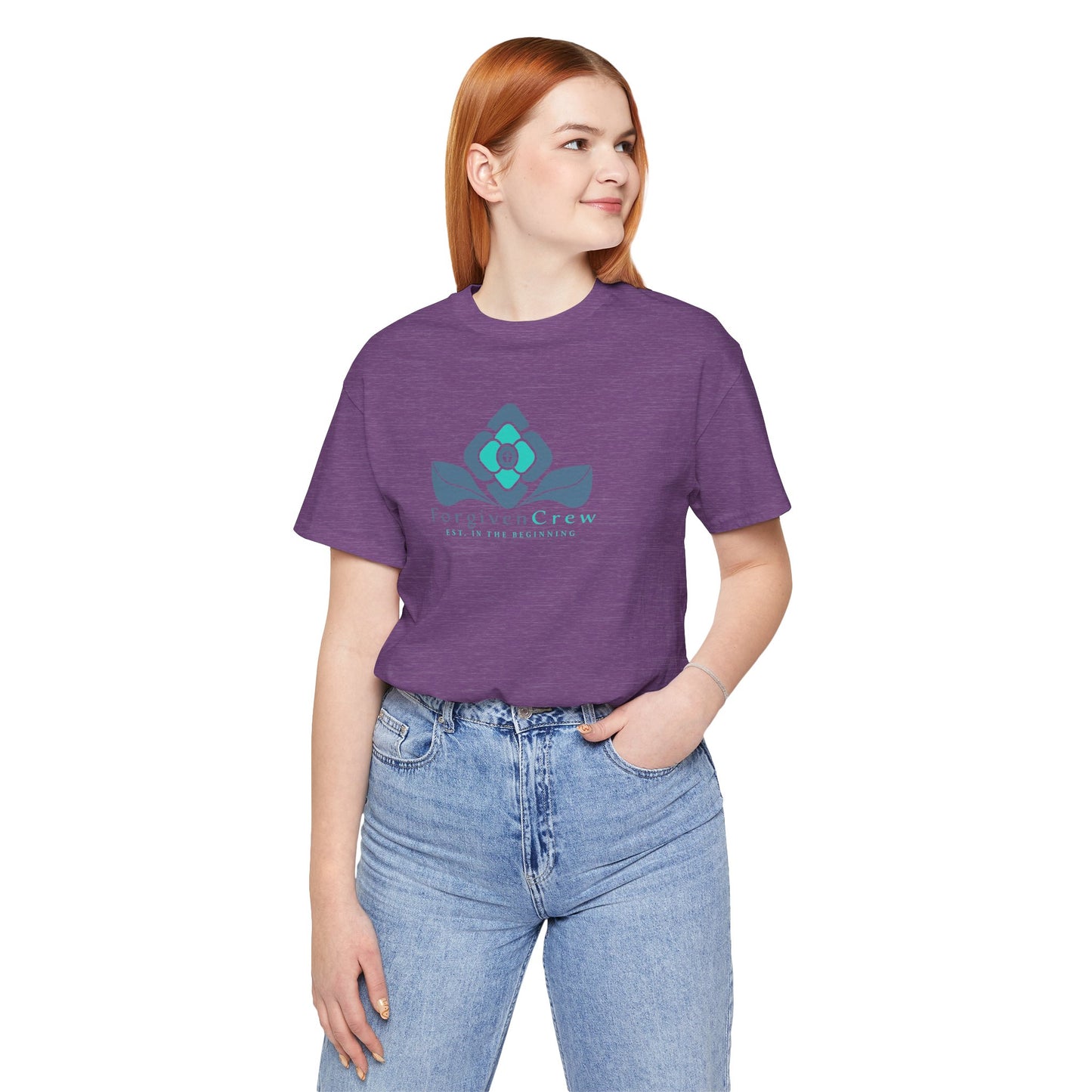 Forgiven Crew Christian Clothing Model showing the front of the purple christian t-shirt, Christian shirt has a blue 2 tones flower with forgiven crew and est. in the beginning printed below the flower